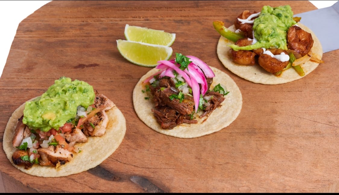 Any 3 Tacos Combo with Rice & Beans.