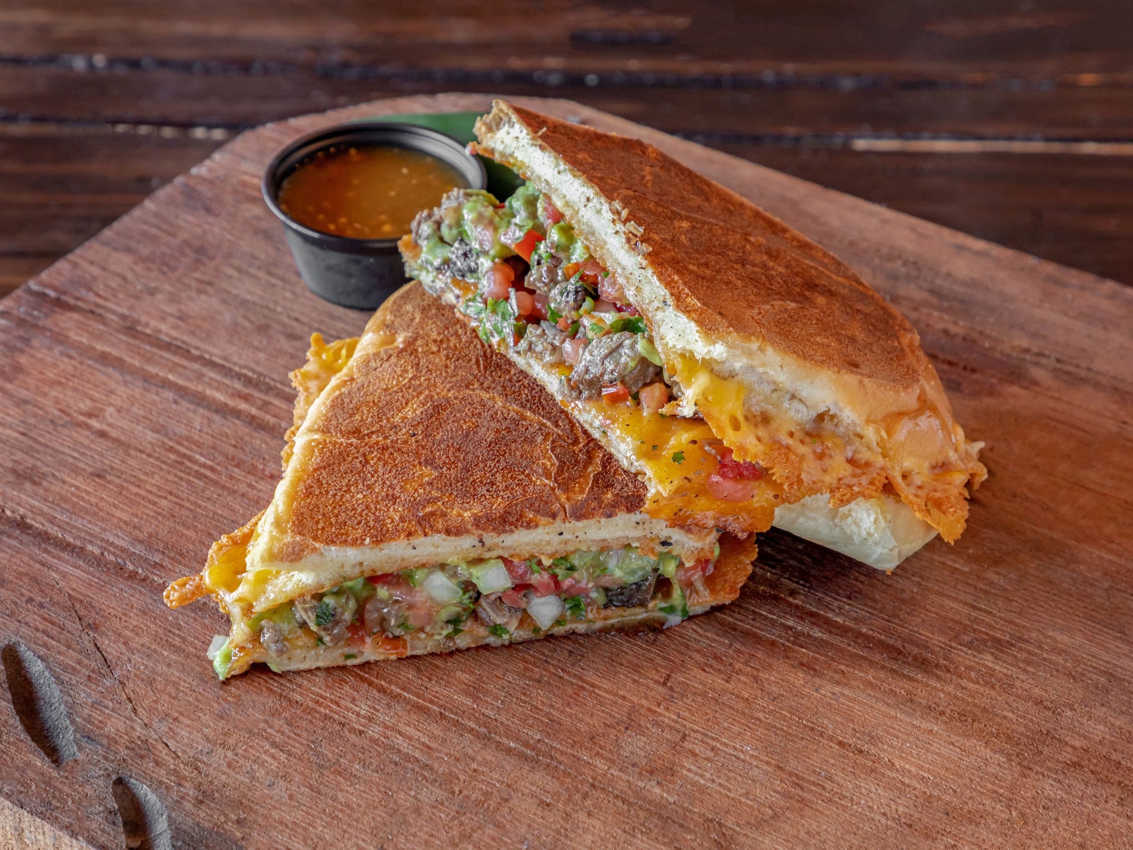 Queso Torta Birria with Consome.